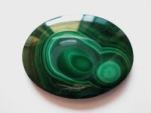 Malachite with its bull-eye swirls which helps us delve into the emotional body, surfacing blocks to be cleared.